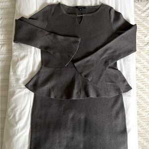 Soft, knit dress with peplum waist.